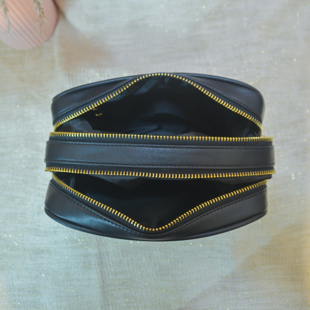 Black Dual Compartment Sling Bag with Black Bullet Belt.