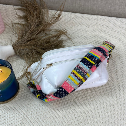 BUM BAG IN WHITE WITH MULTI COLOURED LINE BELT