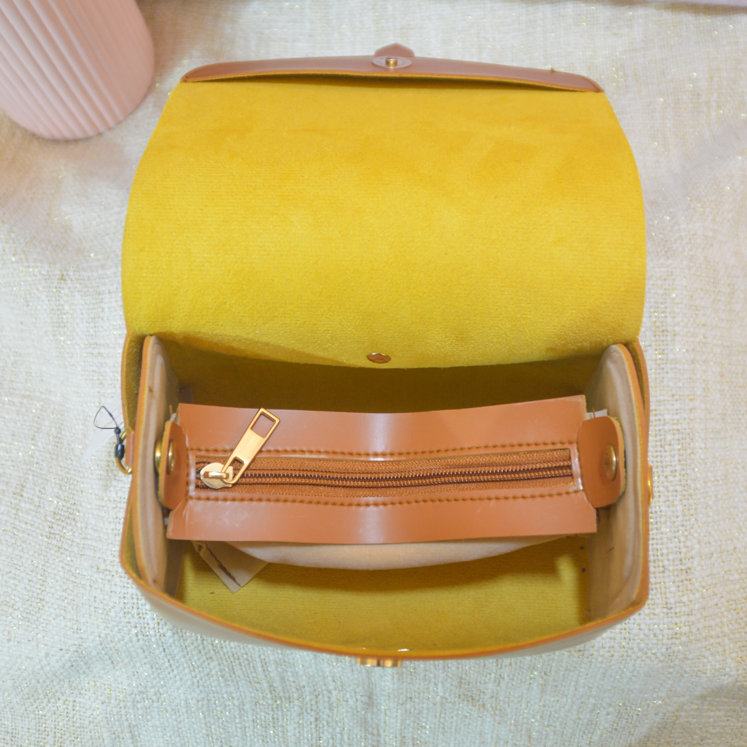 Tan Eva Bag with Neon Belt.